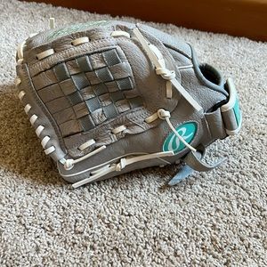 Brand new 11” left handed Rawlings softball glove